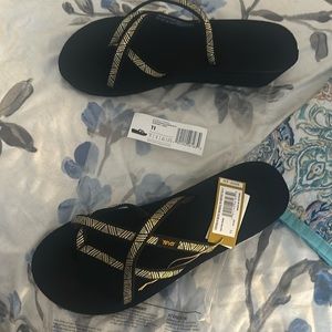 TEVA black and gold sandals